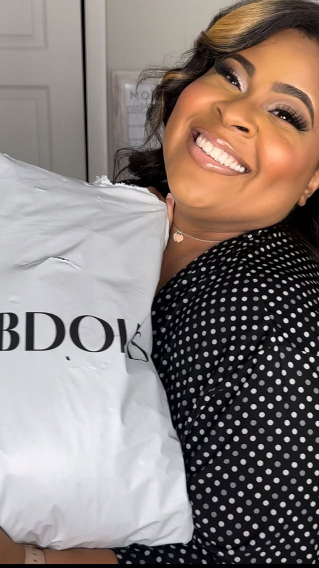 Instagram post by @yourstrulymo for REBDOLLS. Caption reads: Exciting news! I’m officially a @rebdolls....