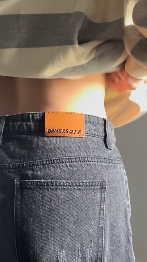 Instagram post by @dhaneeeyela for DRMERS CLUB. Caption reads: looking fresh in my @drmersclub fit 🫶🏼

wearing....