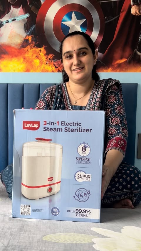 Instagram post by @aarush_heyansh for LuvLap. Caption reads: The LuvLap 3-in-1 Electric Steam Sterilizer [...].