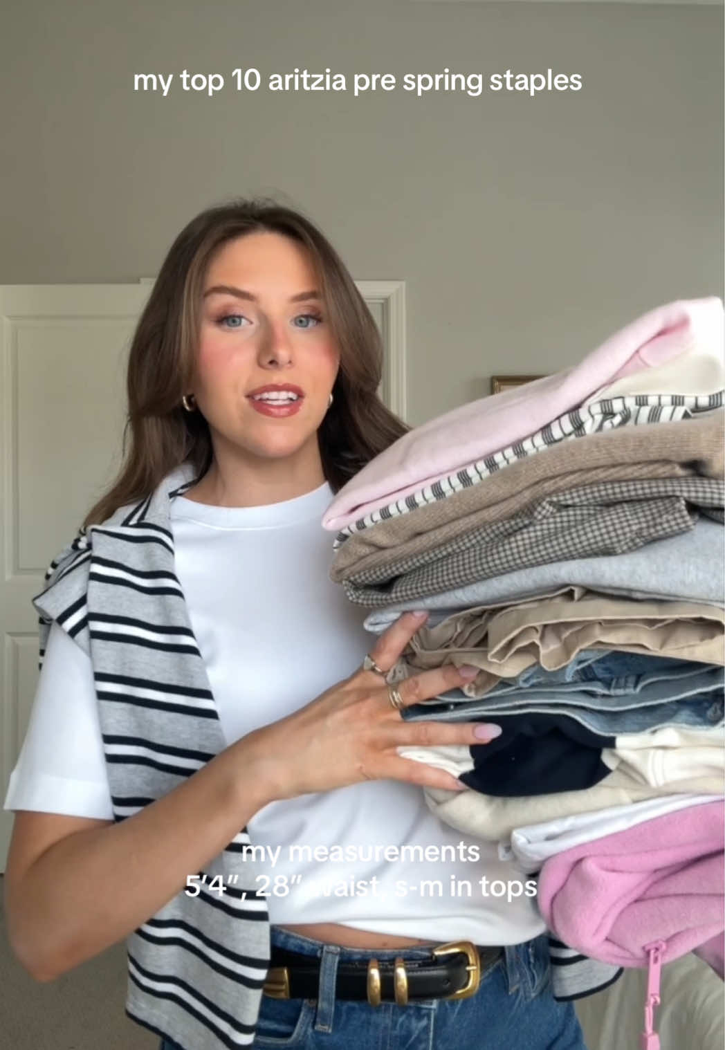 TikTok post by @emilygrace.26 for Aritzia. Caption reads: my @Aritzia pre spring staples 🌷 everything 🔗 on....