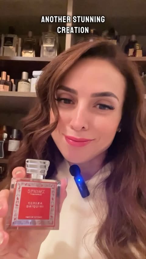 Instagram post by @dinascentales for Sphinx Fragrances. Caption reads: [...] a bottle…that’s Cereza Daiquiri by....