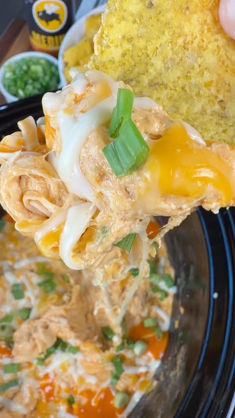 Instagram post by @cookinginthemidwest for Buffalo Wild Wings. Caption reads: [...] paprika 8 oz cream cheese 1/2 cup Buffalo....