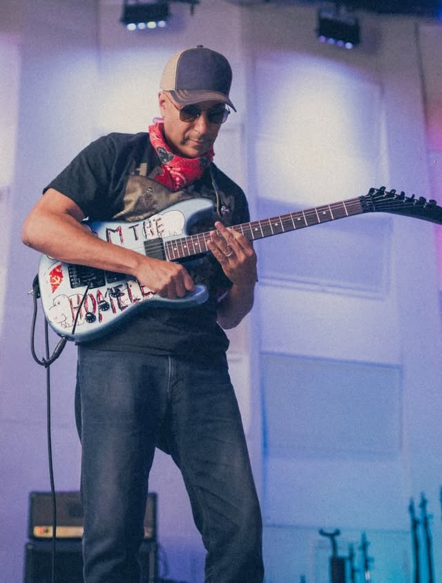 Instagram post by @tommorello for Fender. Caption reads: Introducing Tom Morello’s “Arm The Homeless”....