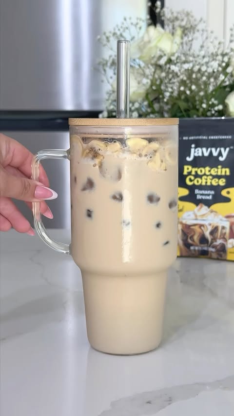 Instagram post by @lyndasedoud for Javvy Coffee. Caption reads: XXL Banana Bread Protein Coffee ☕🍌 @javvycoffee....