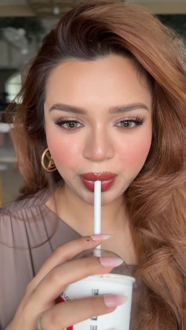 Instagram post by @the_game_of_makeup for Staze Beauty. Caption reads: All eyes on the “I’m Happy” gloss by @Staze9to9 it....