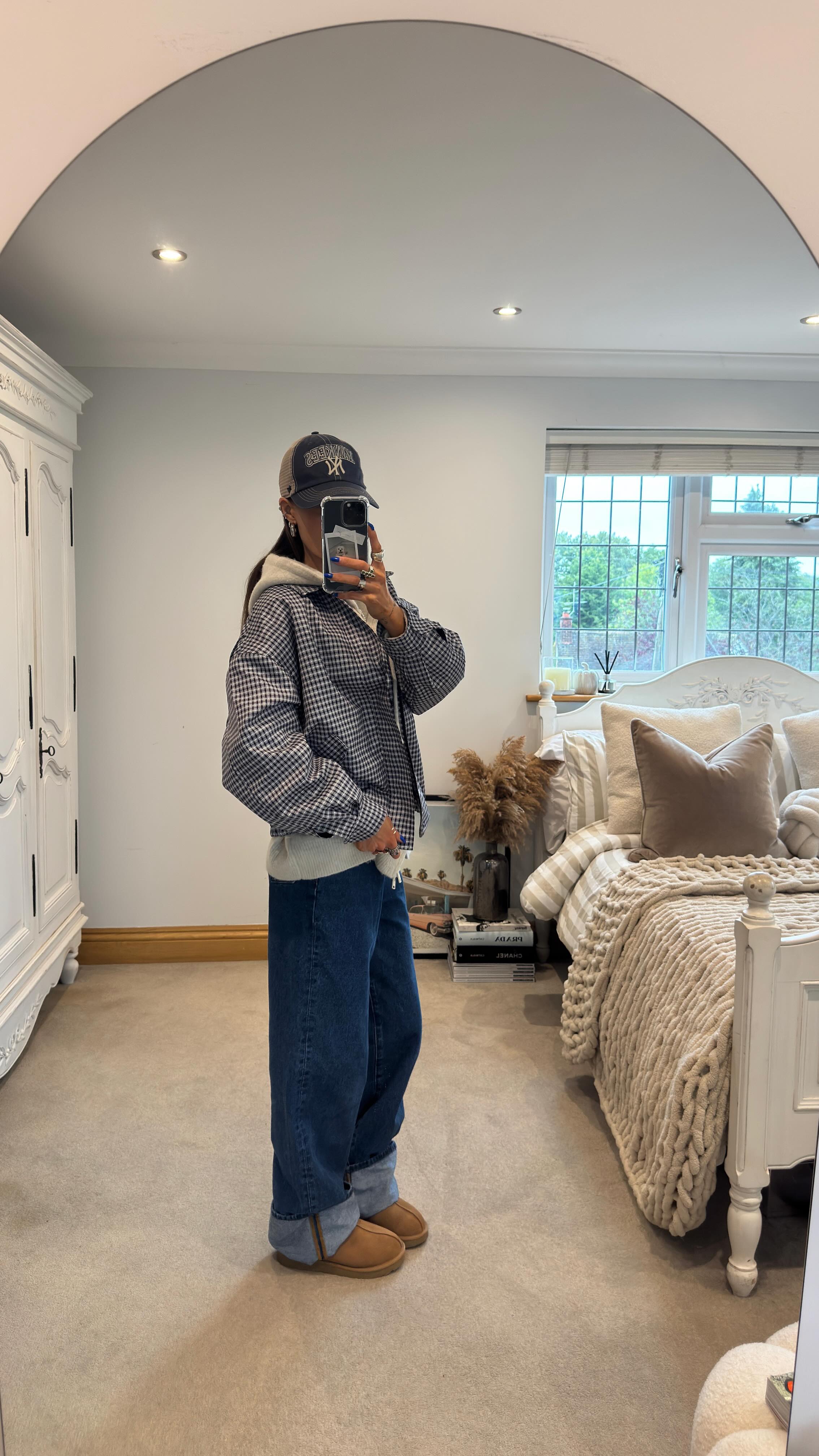 Instagram post by @caitlinheathxo for StockX. Caption reads: UGG season ☕️.