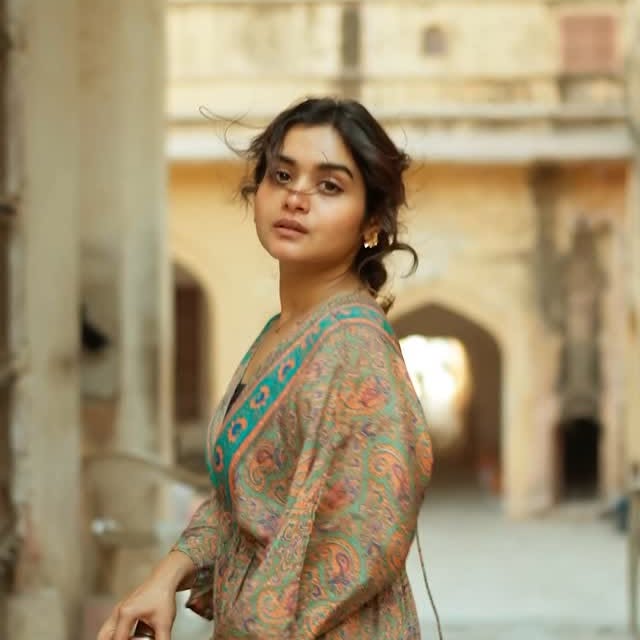 Instagram post by @kiran.mazumder for Victoria's Secret. Caption reads: #ad A touch of royalty, a trail of allure. Amber....