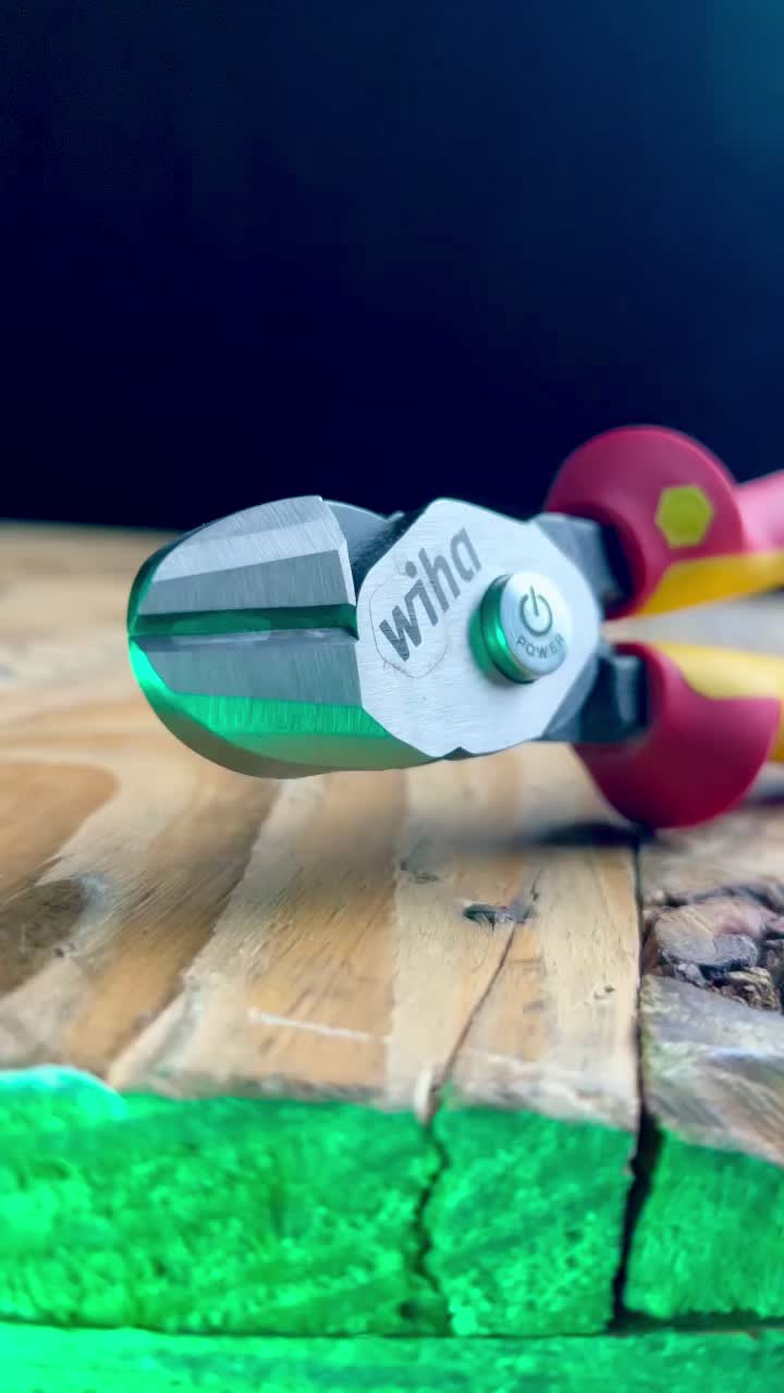 TikTok post by @mad_electrician_official for Wiha Tools. Caption reads: [...] difference, the power button ⚡️ @Wiha Tools....