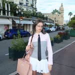 Instagram post by @mashacooperman for Miu Miu. Caption reads: Girl’s therapy at its finest💅😌 #miumiu....