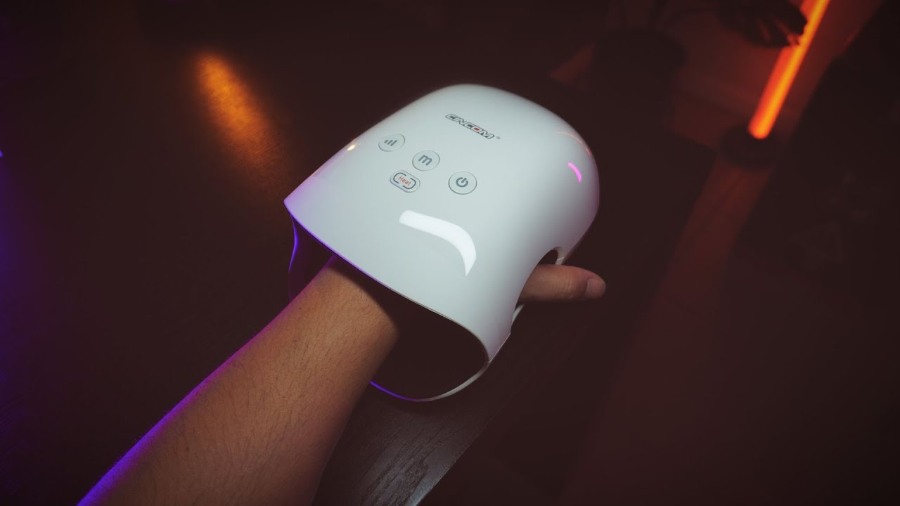 YouTube post by @techutopiareviews for Elgato. Caption reads: CINCOM Hand Massager Review | Perfect for Gamers &....