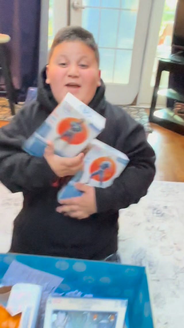 Instagram post by @itztherealrizzler for Hasbro Pulse. Caption reads: Rizz gets surprised with package from Hasbro‼️🤫🤔....