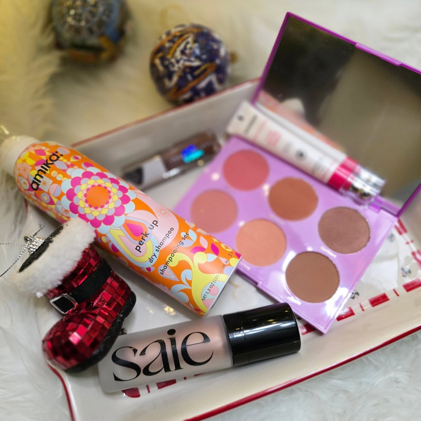 Instagram post by an influencer for IPSY. Caption reads: [...] or achieving a serious glow, @ipsy has....