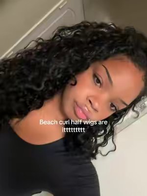 TikTok post by @aliyahmuse for Recool Hair. Caption reads: [...] looking! Beach curly half wig from....