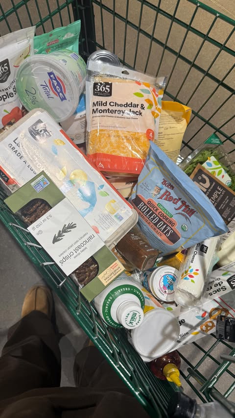 Instagram post by @ellie_teale for Whole Foods Market. Caption reads: Grocery shopping haul 🦃 shockingly everything I....