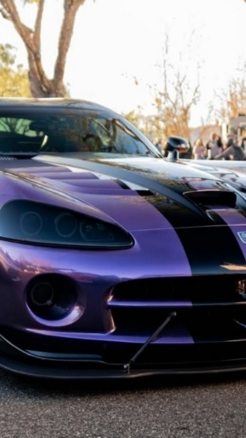 Instagram post by @gmoney.boss for TeckWrap. Caption reads: [...] #titaniumviolet #simboloxwheels #teckwrap....