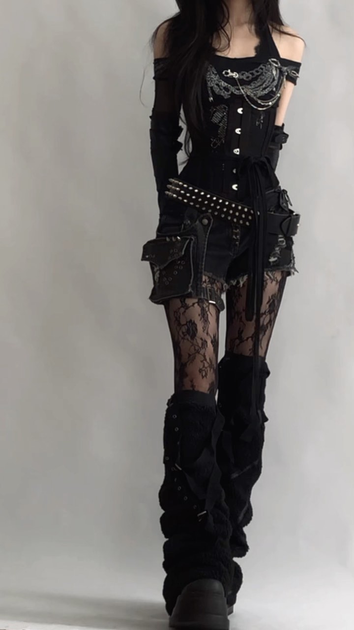 Instagram post by @caminimm for FANTASMAGORIA. Caption reads: messy hair & monochrome outfit @fantasmagoria....