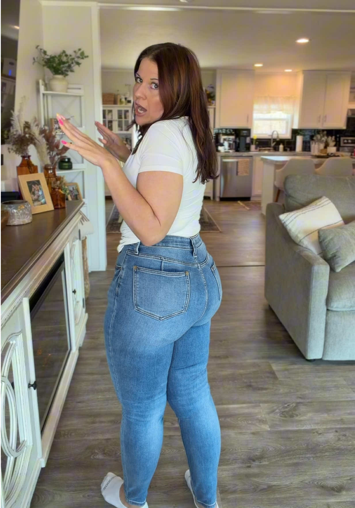 TikTok post by @catshrank for Emma Lous Boutique. Caption reads: @Emma Lous Boutique launched a new Denim line....