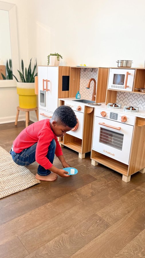 Instagram post by @polishedplayhouse for KidKraft. Caption reads: [...] 3-Piece Play Kitchen Set from @KidKrafttoys.....