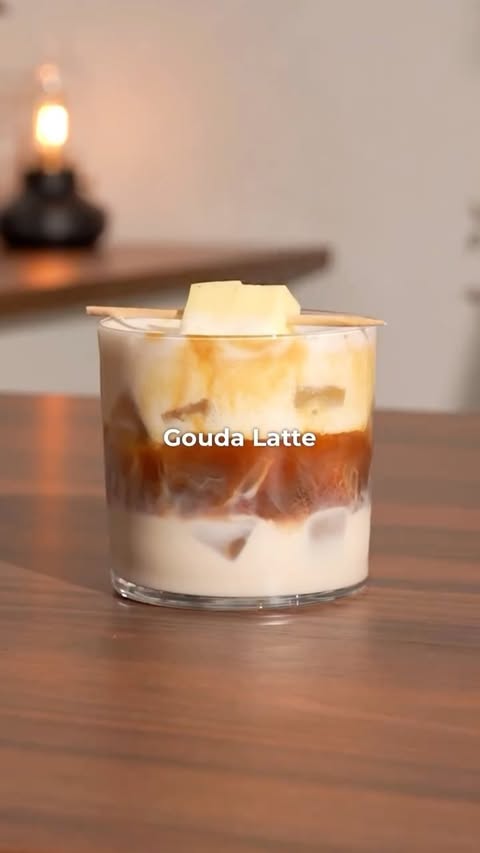 Instagram post by @yourcoffeedude for Sage Appliances. Caption reads: Cheese Iced Latte 🧀 Comment "Sage" for recipe 👀....