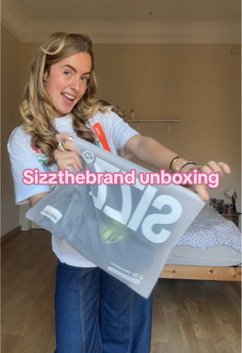 TikTok post by @nienkevwesten for SIZZ THE BRAND. Caption reads: New collection out now!💥💥 @SIZZ the brand....