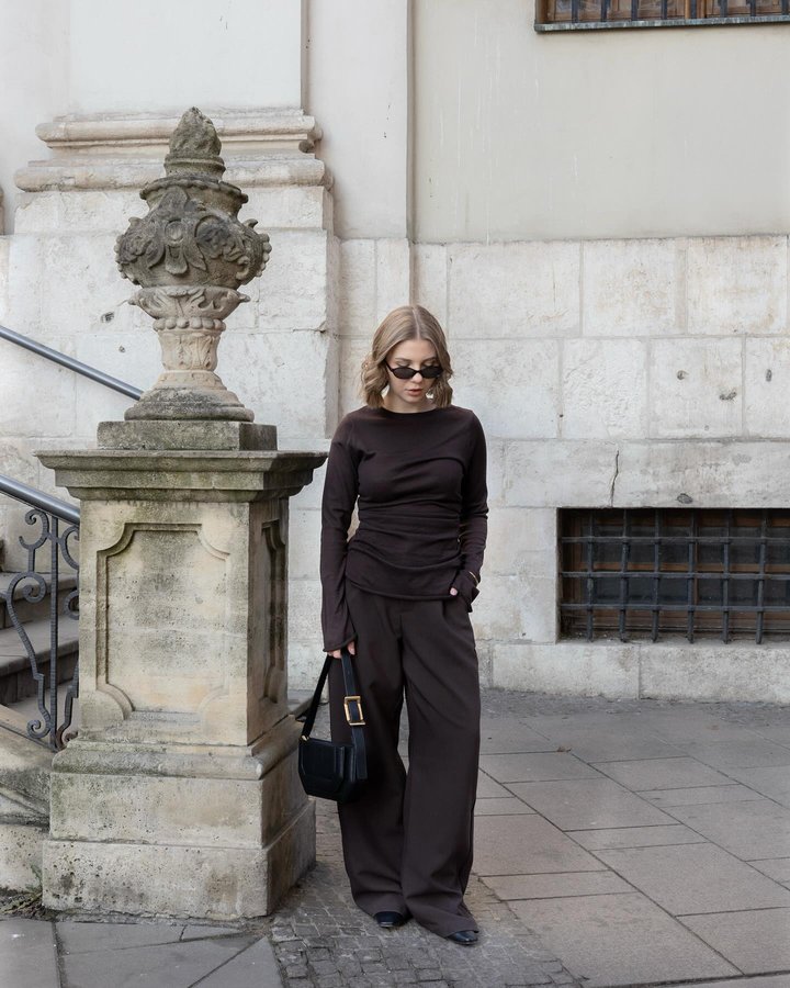 Instagram post by @ola_chrusciel for DISSH. Caption reads: Brown obsession 🤎

@dissh | ad

#brownoutfit....