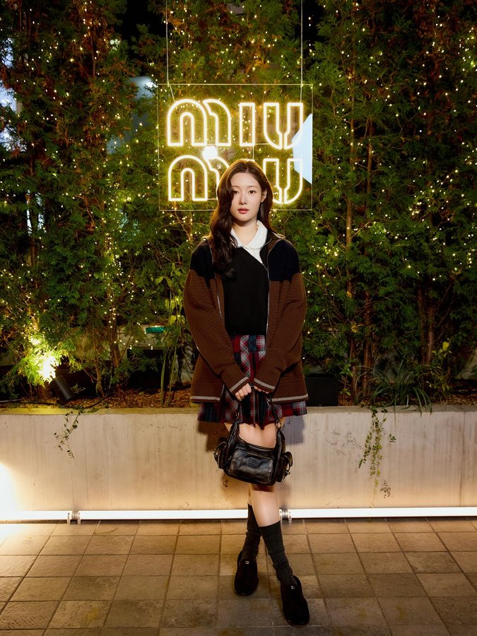 Instagram post by @j_chaeyeoni for Miu Miu. Caption reads: ✨💫💛
 #MiuMiu #MiuMiuSelect #광고.