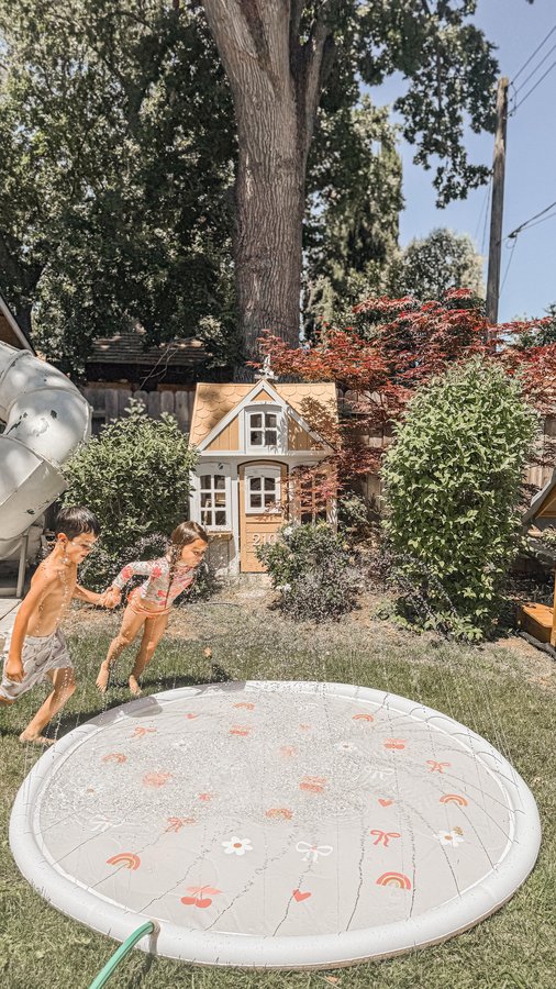 Instagram post by @haleymartinoxo for KidKraft. Caption reads: Splash pad at home 💦✨

We can’t get enough of....