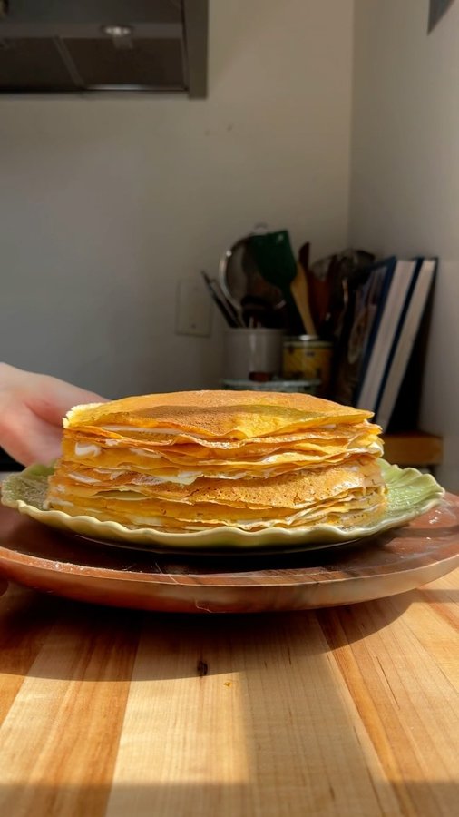 Instagram post by @justine_snacks for Icelandic Provisions. Caption reads: Carrot Cake Crepe Cake! Part 9 of not buying any....