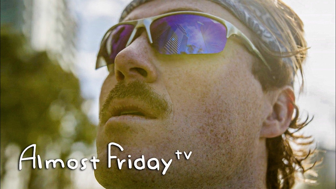 YouTube post by @AlmostFridayTV for EVERY MAN JACK. Caption reads: Man scales ex-girlfriend's apartment building.