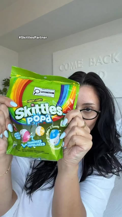 Instagram post by @natdoumkos for SKITTLES. Caption reads: the ASMR on these goes crazy @Skittles Check out....