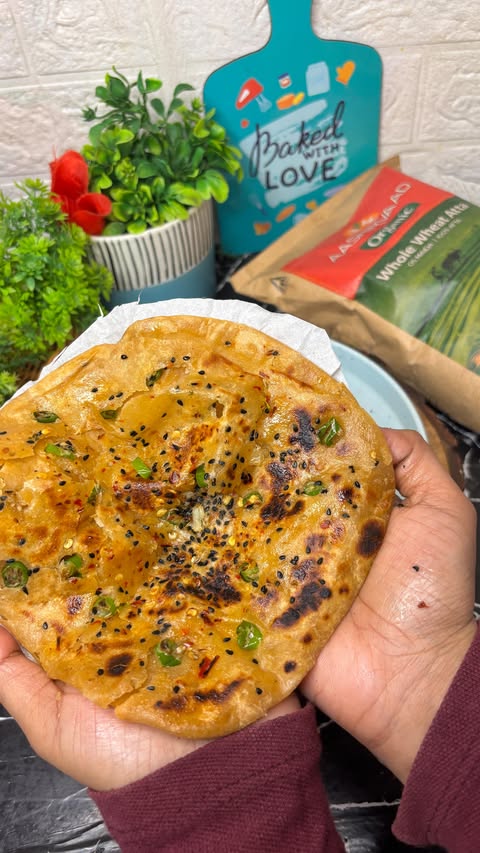 Instagram post by @khana_hi_khana777 for Aashirvaad. Caption reads: हरी मिर्च का तीखा पराठा . . I prefer @aashirvaad....