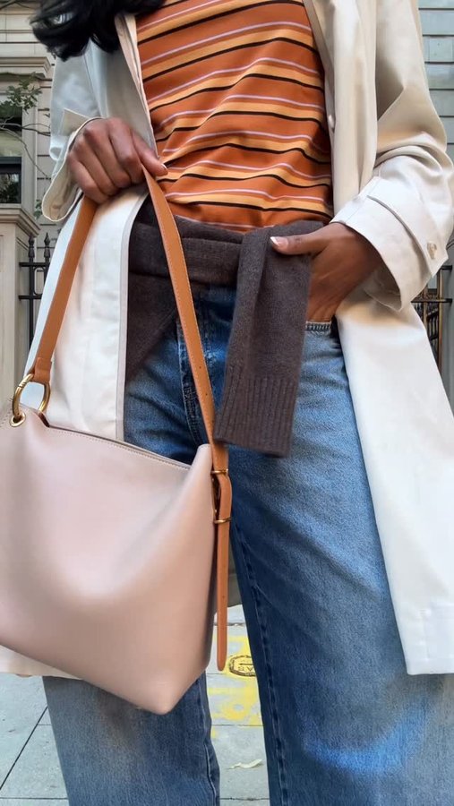 Instagram post by @itsmajobautista for HOBO. Caption reads: [...] Bag in Warm Adobe has been my go-to. ✨....