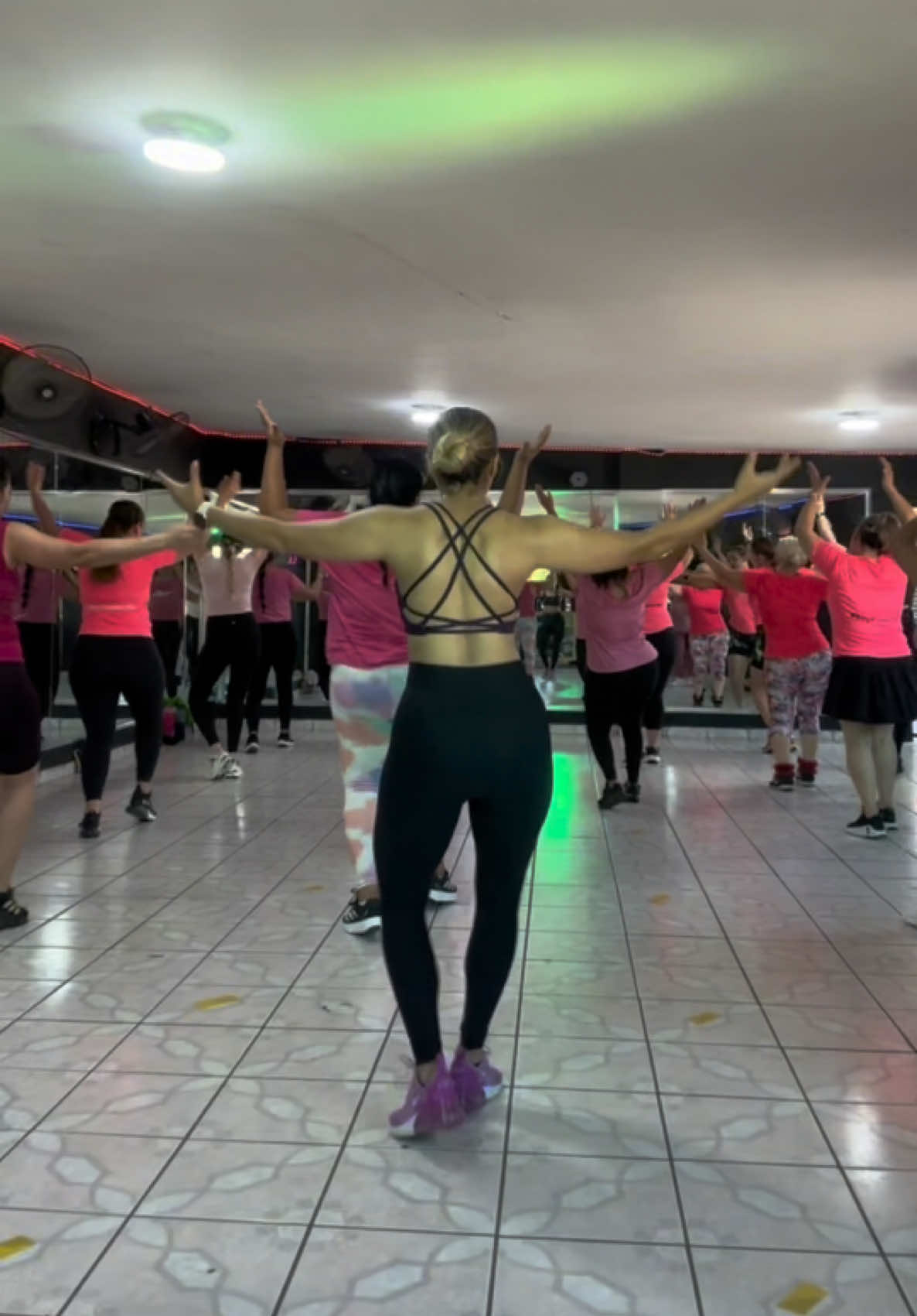 TikTok post by @andrearcc_ for Zumba. Caption reads: Papasitoooo🙊 @Zumba Fitness  #zumba #powerlife....