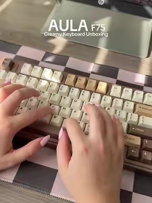 TikTok post by @lifewithkymberly for Aula. Caption reads: [...] #cozydesksetup #mechanicalkeyboard @Aula.