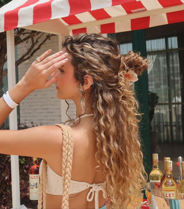 Instagram post by @cachoslua_ for Hidratei. Caption reads: que dia gostoso 🐚.