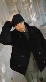 Instagram post by @stefanodemartino for Herno. Caption reads: Layering. @herno_official #adv #Herno #HernoClub.