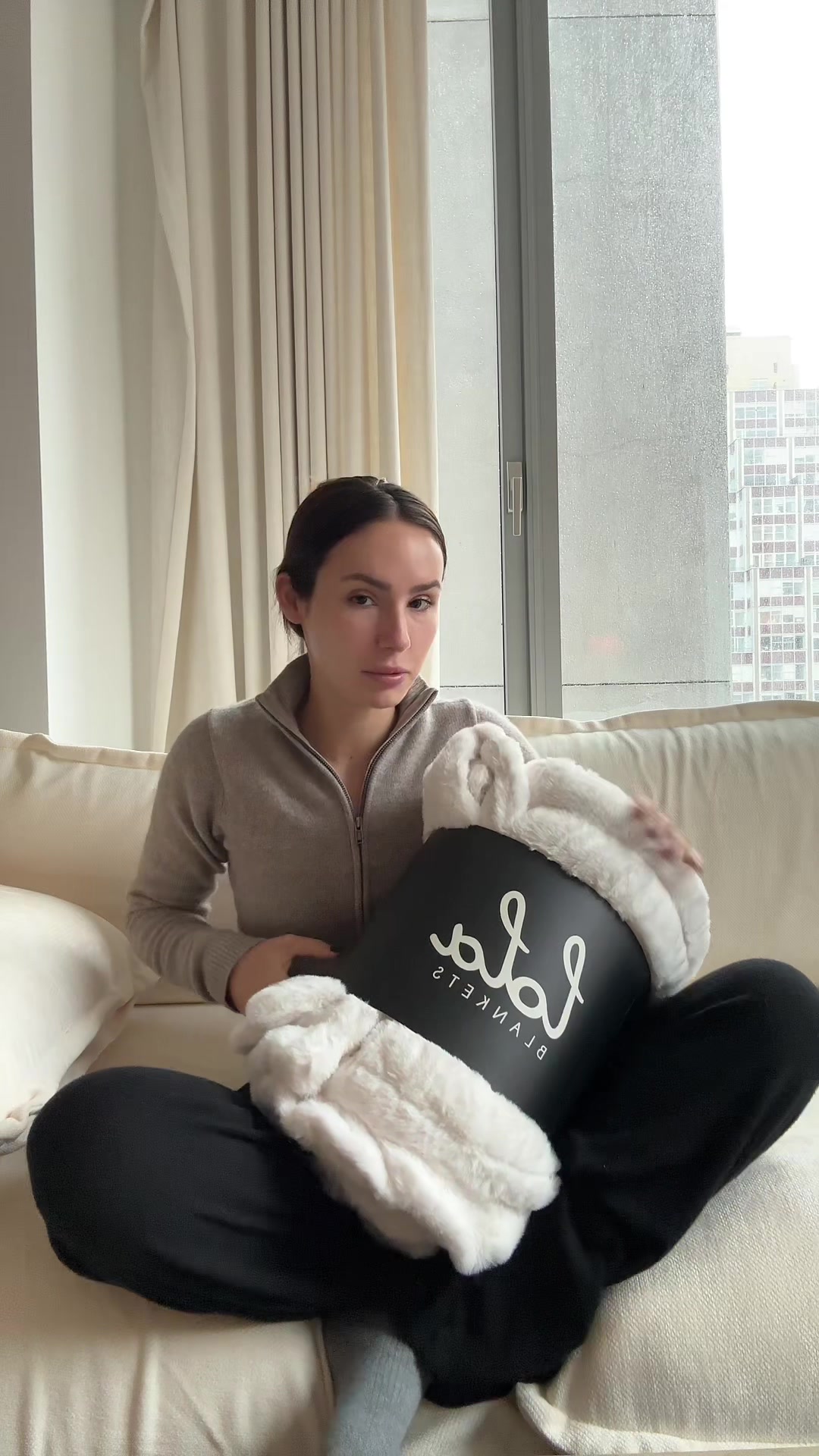 TikTok post by @ashtinearle for Lola Blankets. Caption reads: seriously the softest thing ever @lolablankets use....