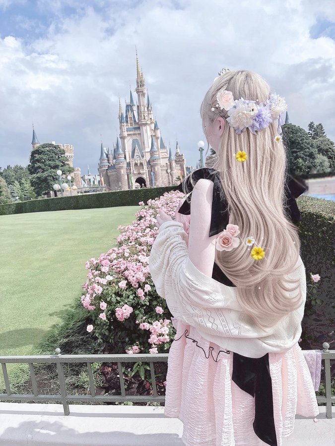 Instagram post by @eviebunniex for Tokyo Disney Resort. Caption reads: [...] most of our time at @disneyland....