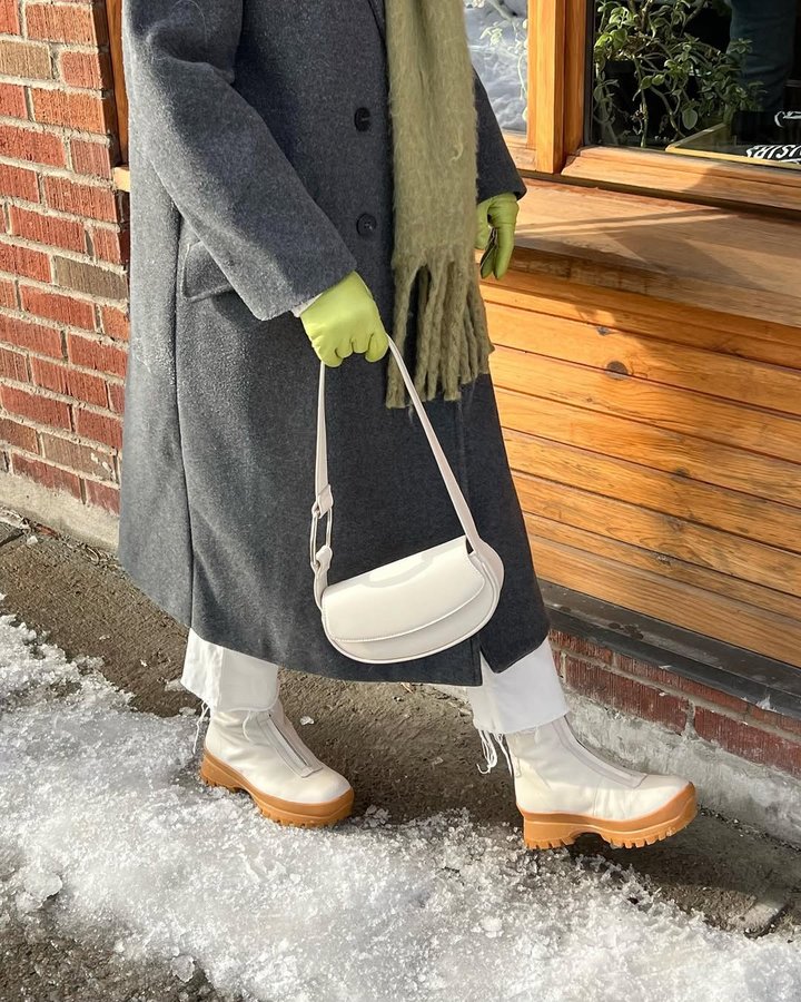 Instagram post by @florencestignan for Maguire Shoes. Caption reads: [...] from head to toe this winter with....