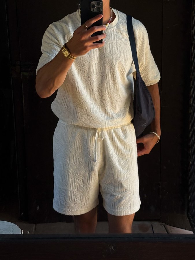 Instagram post by @andiisbae for Lyle & Scott. Caption reads: can‘t get enough from this 🌤️🏝️📖 / Ad - my look....