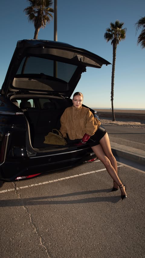 Instagram post by @iamannacasey for FERRAGAMO. Caption reads: Golden hour, elevated essentials. Wrapped in a....