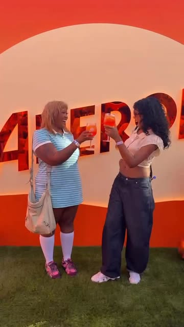 Instagram post by @domrobxrts for Aperol Spritz. Caption reads: best coachella day 1 with @aperolspritzofficial 🥂....