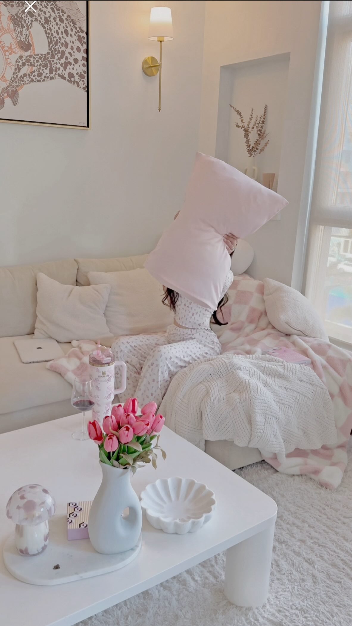 Instagram post by @chisapasc for fluff. Caption reads: [ad] @fluffco making my favorite corner cozier,....