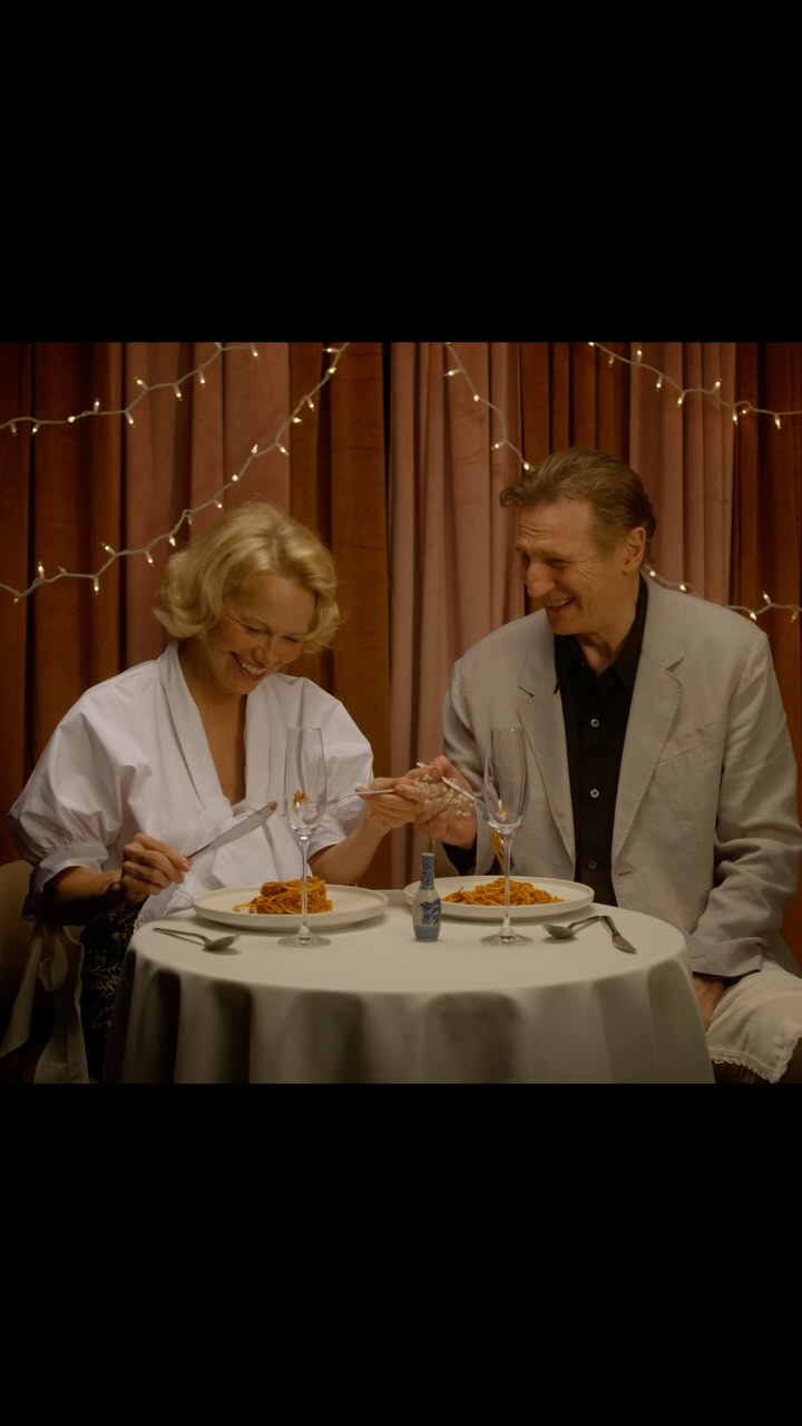 Instagram post by @discussingfilm for Paramount Pictures. Caption reads: Liam Neeson and Pamela Anderson reveal how they....