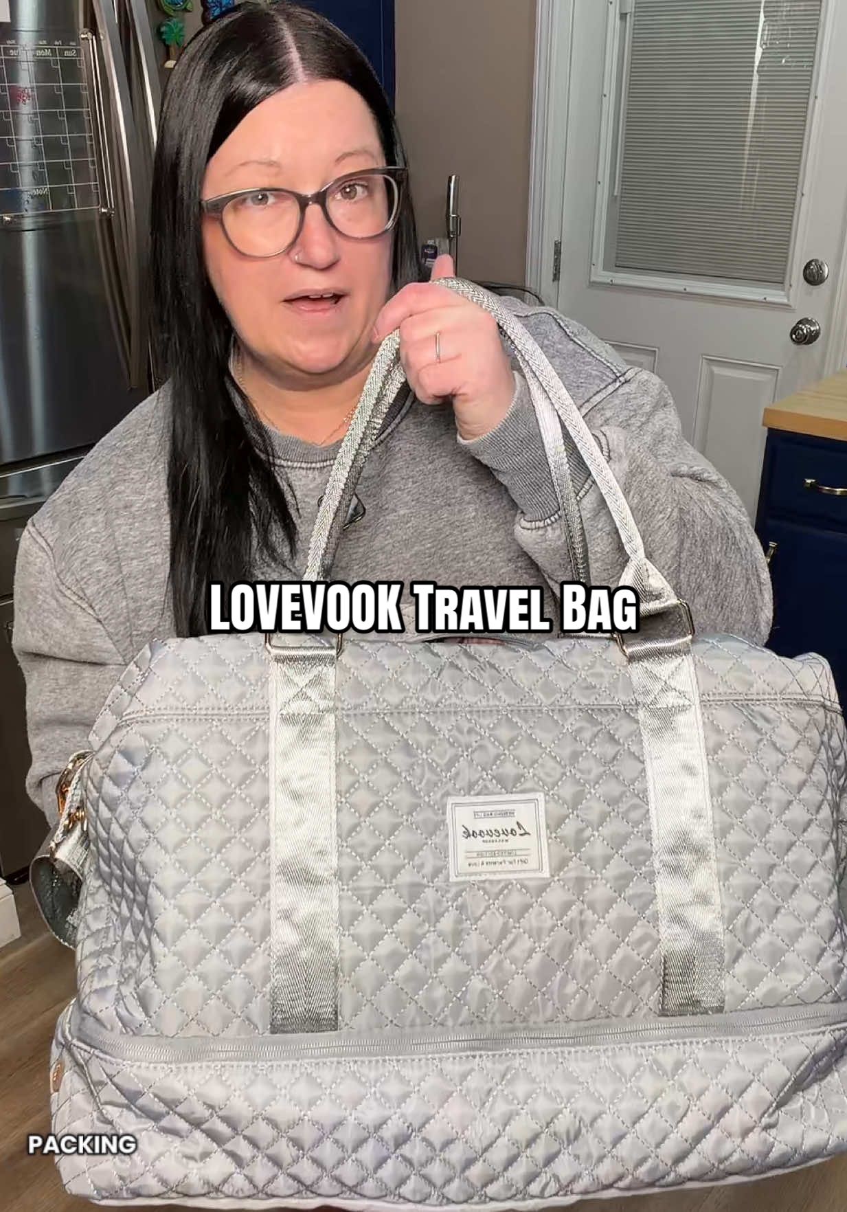 TikTok post by @trishie1026 for Lovevook. Caption reads: [...] keep you stressed. Get the @Lovevook Bags....