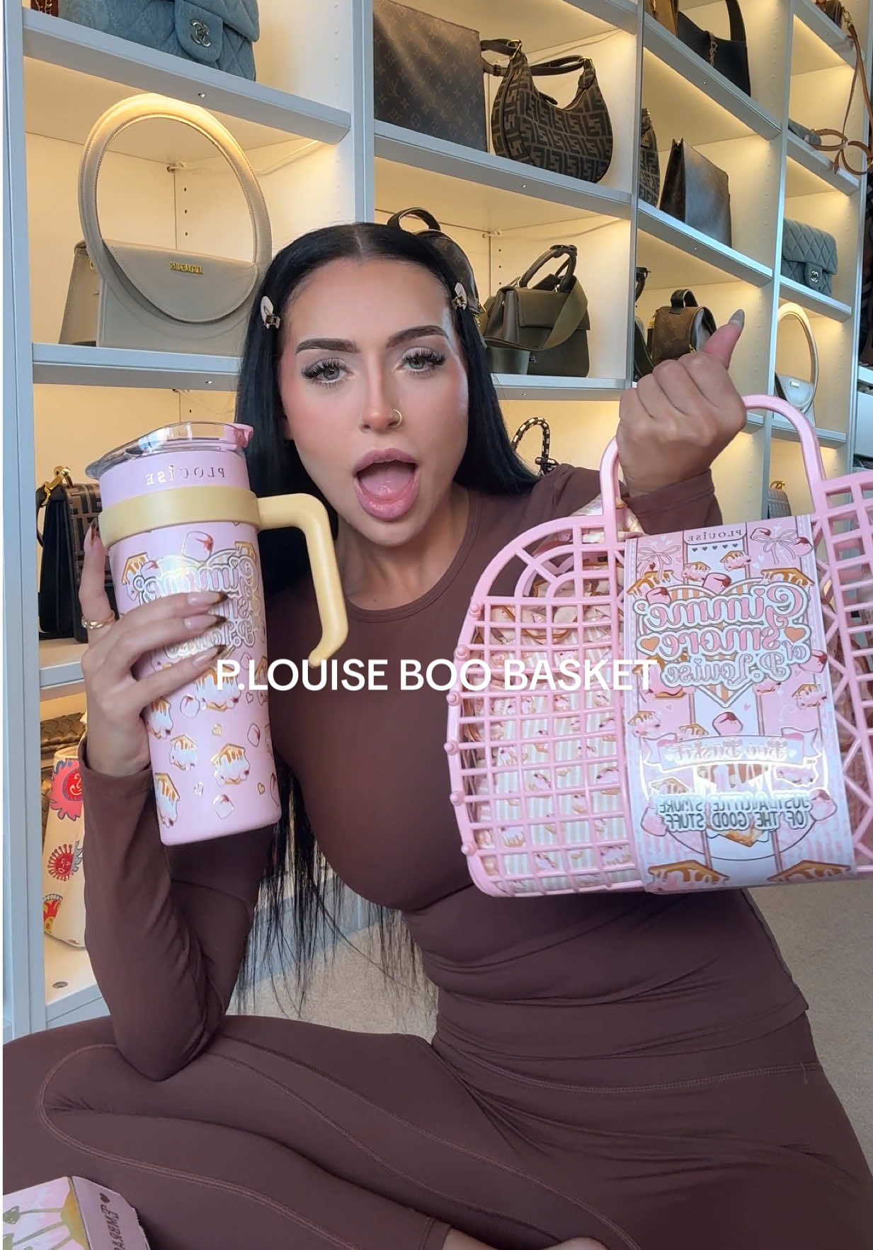 TikTok post by @oliviaprecious for Plouise. Caption reads: Unboxing the @PLOUISE gooey s’mores BOO BASKET....