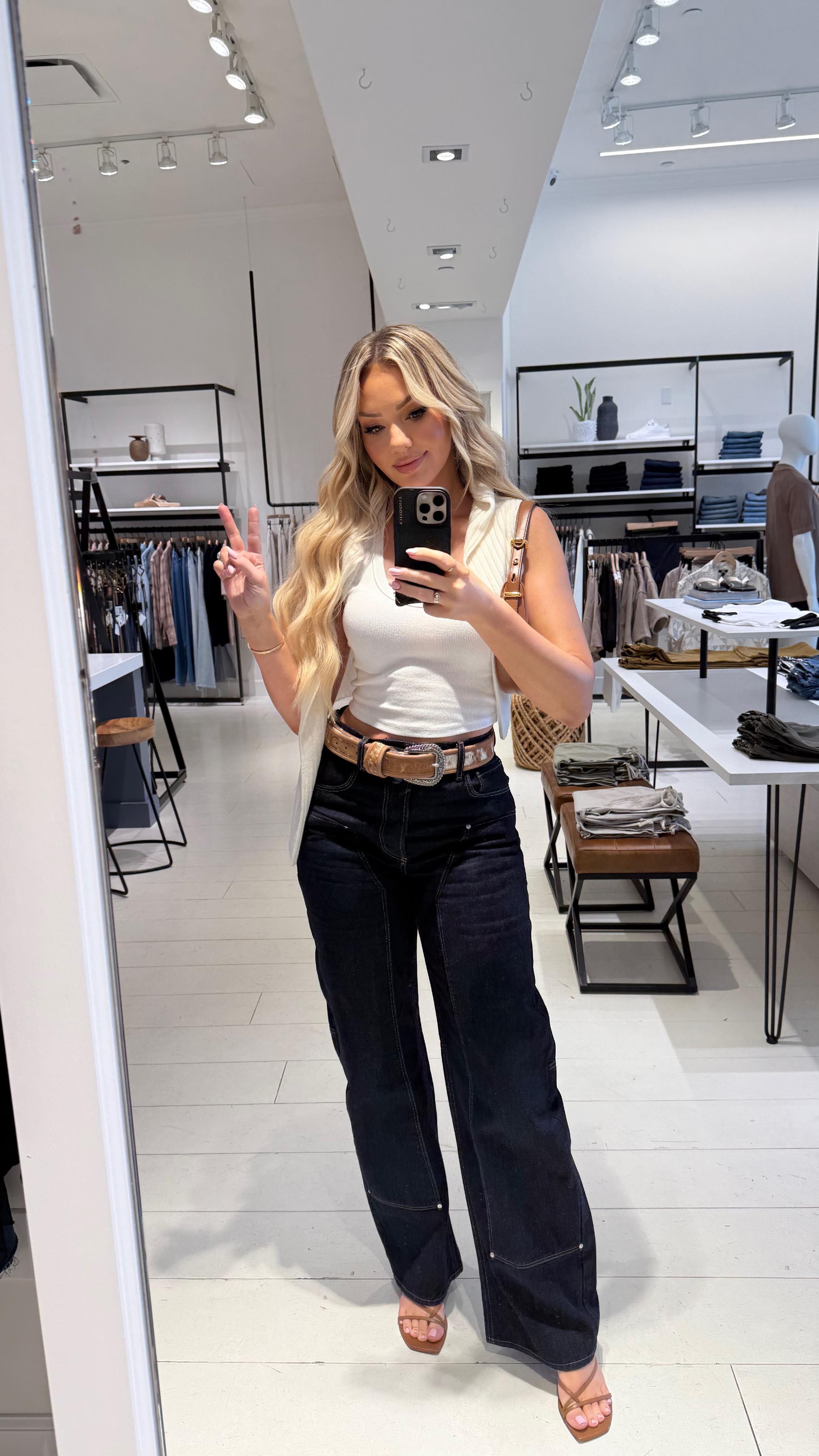 Instagram post by @chelseafreeman5 for Paige. Caption reads: Shopping day with @paige ✨ I got the cutest new....