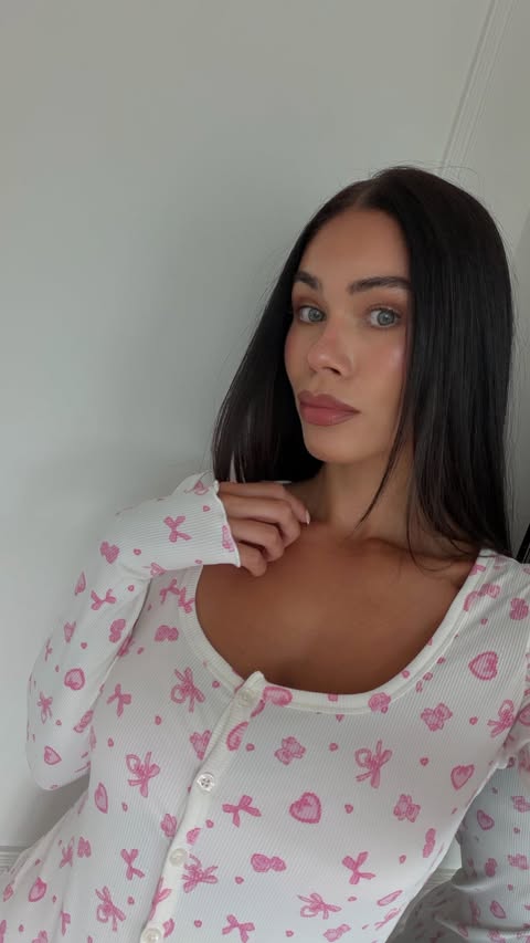 Instagram post by @lauren_bakewell for Boux Avenue. Caption reads: just a girl & cute pjs 🎀 @bouxavenue ad.