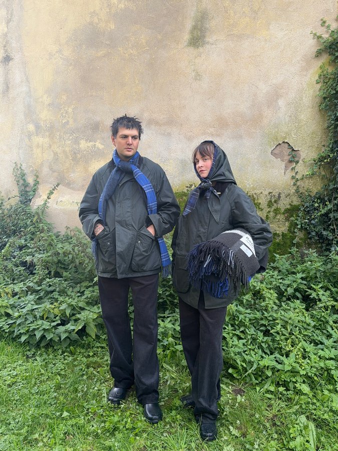 Instagram post by @sissi_pohle for ARKET. Caption reads: Wet and misty meadows are perfect for a walk in....