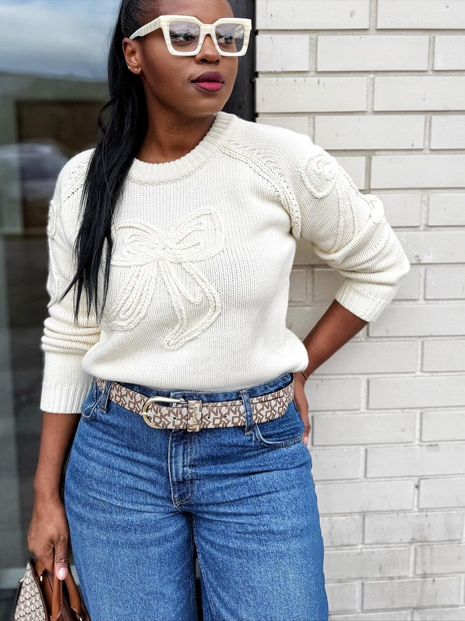 Instagram post by @thestylishmum_ for Izabel London. Caption reads: How to stay warm yet stylish this freezing winter?....